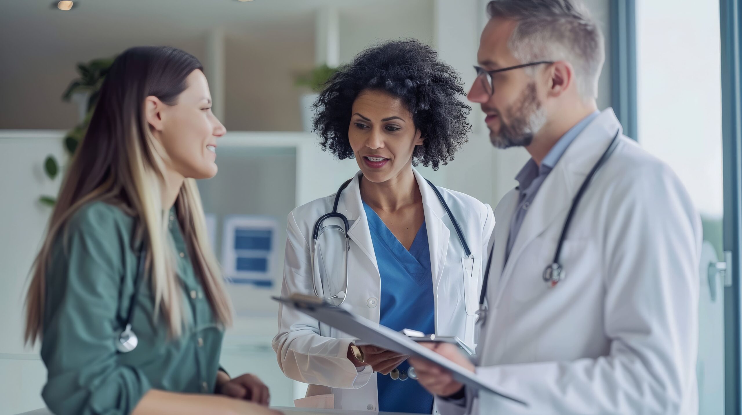 healthcare-professional-explaining-medical-chart-attentive-parents healthcare-professional-explaining-medical-chart-attentive-parents